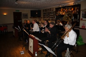 LIMEHOUSE JAZZBAND on 2014 Tour - from Holland (Limers) play at Farnborough Jazz Club, Kent, UK (Limeys) on 24th October 2014. Band: ROBERT DUIS (cnt1&ldr), GUIDO CORNET(cnt2&tutr), RUUD PETRI(trb), HENRI GIEBELS(tnrsx, clt&vocs), WILLEM HELLBREKER(alt sx1&clt), MARTEN DE NES(alt sx2&clt), SIR WIL VAN SCHAIK(bj), LOUËS HOUET(pno), PIETER VOS(tba) & ROB BAKKER(pctn, wshb&voc). Photo: Mike Witt