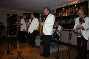 Tony Pitt's All Stars at Farnborough Jazz Club, Kent, UK on 21st November 2014.(ltoR) Roy Williams (trmb), Denny Islett (trmp), (out of sight Trevor Evans (bass), Al Nichols (rds), John Elmer (drms) & Tony Pitt (bnj) Photo by Mike Witt.