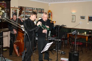 Phoenix Jazz Band at Farnborough Jazz Club, 5th December 2014. (LtoR) Roger Curphey (d.bass), Paul Higgs (trumpet) and Robin Coombs (Leader& clarinet).  Photo by Mike Witt