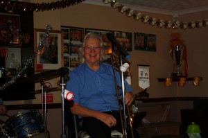 A fabulous photo of George Tidiman at Farnborough Jazz Club's Christmas Cracker Party (with his All Stars) 19th December2014.