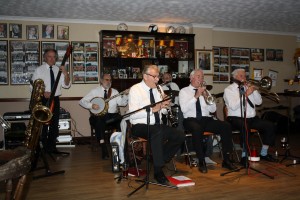 LORD NAPIER HOTSHOTS at Farnborough Jazz Club, 16th January 2015. MIKE JACKSON (trmpt), MIKE DUCKWORTH (trmb), PAT GLOVER (reeds), JOHN STEWART (bnj), MICK SCRIVEN (d.bass&bass sax) and ARTHUR FRYATT (drms). Photo by Mike Witt.