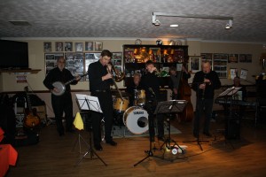 Phoenix Dixieland Jazz Band at Farnborough Jazz Club on 22nd January 2015. Leader Robin Coombs (clarinette), Paul Budd (trumpet), Bill Todd (tromb), Dave Barnes (piano), Roger Curphey (d.bass), John Stewart (banj&guitar) and Allan Clarke (drms). Photo by Mike Witt.