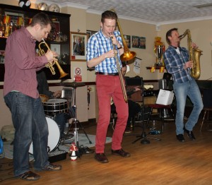 Martyn Brothers' front line Allen Beechey (trumpet), George Simmons (trombone) & Julian Webster Greaves (sax) @ Farnborough Jazz Club, Kent on 6th February 2015. Photo by Mike Witt.