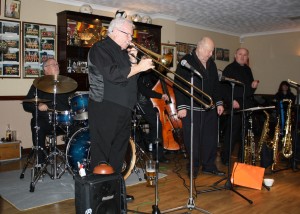 Mike Barry's XXL Jazz Band with Mike (trmp), Rex Odell (trmb) John Elmer (sop.sax), John Stuart (bnjo), Trefor 'Fingers' Williams (d. bass) & Paul Budd (drums) at Farnborough Jazz Club, 13th Feb2015. Photo by Mike Witt.