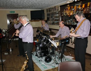 Savannah Jazz Band at Farnborough Jazz Club on 27th March 2015.  With Ldr &drums John Meehan, Bill Smith (crnt), Roger Myerscough (clrn), Brian ‘Sam’ Ellis (trmb), Tony Pollitt (bass) & Andy Maynard (bnj). Photo by Mike Witt.