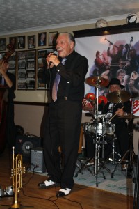 Brian Webb sings with Dave Rance's Rockin' Chair Band at Farnborough Jazz Club (Kent) on 12th June 2015. Photo by Mike Witt.