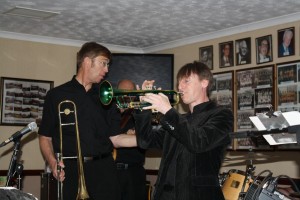 Bill Todd on trombone and Paul Higgs on trumpet (John Stewart banjo - obscured from view) with Phoenix Dixieland Jazz Band at Farnborough Jazz Club on 5th June 2015. Photo By Mike Witt.