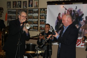 Peter Brown on trumpet, Julyan 'Baby Jools' Aldridge on drums and clarinetist Matt Palmer - band leader of Millenium Eagle Jazz Band at Farnborough Jazz Club (Kent) on 24th July 2015. Photo by Mike Witt.
