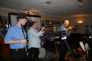 Tim Huskisson (clarinet), Denny Islett (trumpet) & George 'Kid' Tidiman's (trombone) with his 'All Stars' at Farnborough Jazz Club on 31st July 2015. Photo by Mike Witt.