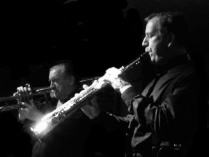 Al Nicholls (alto) and Denny Ilett (trumpet), two of Tony Pitt's All Stars, playing for Keith's special birthday at Farnborough Jazz Club on 14th August 2015. Photo by Chrissie Nicholls.