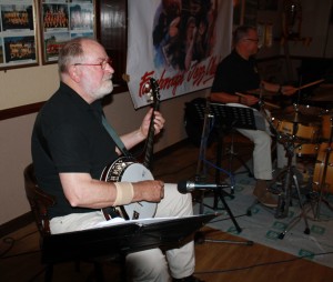 Storeyville Jazz Band, HENK VAN MULLIGEN (banjo) at Farnborough Jazz Club, Kent UK 28Aug2015. Photo by Mike Witt