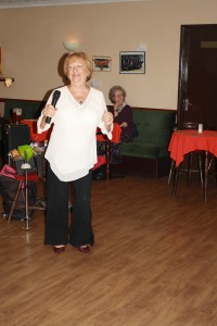 Jan Smith sings a couple of song with George 'Kid' Tidiman's All Stars at Farnborough Jazz Club on 18th September 2015. Photo by Mike Witt.