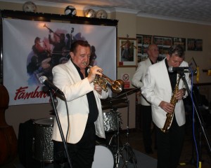 Al Nichols plays alto sax with Denny Ilett on trumpet and Tony Pitt on banjo, all seen here with 'Tony Pitt's All Stars' at Farnborough Jazz Club (Kent) on 9th October 2015. Photo by Mike Witt.
