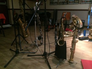 Mardi Gras JazzBand at Farnborough Jazz Club on 20th November 2015. Photo of John Elmer's musical collection of saxes & clarinets - shows his wonderful talent aye? (sousa belongs to Brian). Photo by Liz.