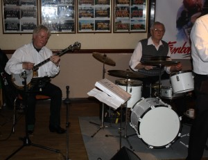 Dave Price on banjo and Graham Collicote on drums with Bob Dwyer's Bix & Pieces at Farnborough Jazz Club on 29th January 2016. Photo by Mike Witt.