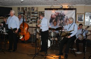 Barry Palser's Super Six play at Farnborough Jazz Club (Kent) on 12th February 2016. (LtoR) Barry Palser (trombone), Allan Morgan (double bass), Allan 'Lord Arsenal' Bradley (trumpet, John Tyson (drums), John Crocker (tenor sax) & Tony Pitt (banjo). Photo by Mike Witt.