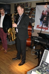 Jonny Boston plays tenor sax with his 'Jonny Boston's Hot Jazz' on tour at Farnborough Jazz Club, Kent, UK 4mar2016