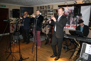 Jonny Boston's Hot Jazz on tour at Farnborough Jazz Club, Kent, UK. (LtoR) Dave Hewitt (trombone), Gary Wood (trumpet), Jonny Boston (reeds), Tim Huskisson (piano) (out of view: Martin Guy (drums) & Trefor 'Fingers' Williams (d.bass)). 4th March 2016. Photo by Mike Witt.4Mar2016