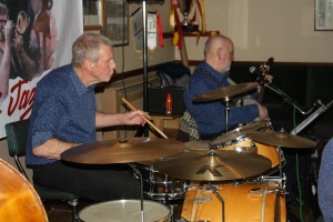 Chris Marchant on drums and 'Southend Bob' Albutt on banjo with Mahogany Hall Stompes at Farnborough Jazz Club (Kent) on 5th February 2016. Photo by Mike Witt.