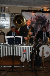 Mardi Gras JazzBand play at Farnborough Jazz Club (Kent) on 19th February 2016. (LtoR) Marc Easener (sousaphone), John Ellmer (tenor sax) and Paul Baker (drums) Photo by Mike Witt.