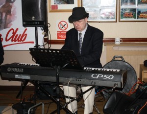 Such concentration on the face of Tim Huskisson, playing piano for the Mardi Gras JazzBand at Farnborough Jazz Club (Kent) on 19th February 2016. Photo by Mike Witt.