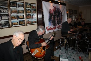 'Engine' of Laurie Chescoe's Reunion Band at Farnborough Jazz Club (Kent) on 22apr2016. (LtoR) Colin Bray (piano), Jim Douglas (banjo/guitar), Laurie Chescoe (drums) and Peter Skivington (bass guitar & bass ukelele). Photo by Mike Witt.