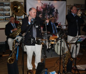 John Ellmer plays blocks&cymbals with Paul Baker on drums and Marc Easener on plus Leigh Henson on trumpet for Mardi Gras JazzBand at Farnborough Jazz Club (Kent) on 13th May 2016. Photo by Mike Witt.