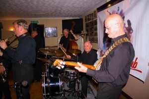 'Tony Pitt's All Stars' at Farnborough Jazz Club (Kent) on 6th May 2016. Band leader Tony Pit - rightt (banjo). then (LtoR) Al Nicolls (alto sax), Alan Gresty (trumpet), Andy Lawrence (d.bass) and John Ellmer (drums). Photo by Mike Witt.