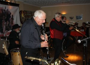 Dave Rance's Rockin' Chair Band at Farnborough Jazz Club (Kent) on Friday 10th June 2016. (LtoR) Henry Harrison (drums), Derek Scofield (clarinet), Dave Rance (trumpet) & Graham Wiseman (trombone). Photo by Mike Witt.