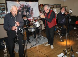 Dave Rance's Rockin' Chair Band front line at Farnborough Jazz Club (Kent) on Friday 10th June 2016. (LtoR) Derek Scofield, Henry Harrison, Dave Rance and Graham Wiseman. Photo by Mike Witt.