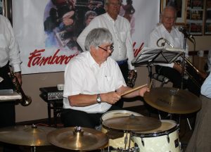 Pete Lay (drums), Dave Rance (1st trumpet) and George 'Kid' Tidiman (trombone) play for Yerba Buena Celebration Jazz Band at Farnborough Jazz Club (Kent) on 3rd June 2016. Photo by Mike Witt.