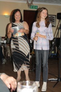 Joc takes over with the raffle draw, here at Farnborough Jazz Club (Kent) UK on 15th July 2016. The band - 'Barry Palser's Super Six', Photo by (Granddad) Mike Witt.