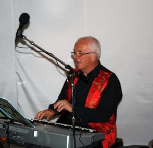 Dave Barnes seen here playing piano for Phoenix Dixieland Jazz Band at Farnborough Jazz Club on Friday, 19th August 2016. Photo by Mike Witt.