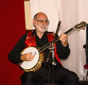 John Stuart, playing banjo for Phoenix Dixieland Jazz Band at Farnborough Jazz Club on 19th August 2016. Photo by Mike Witt.