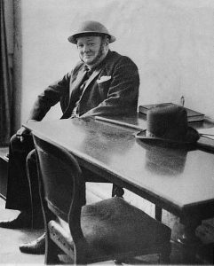 Winston Churchill, Prime Minister - wears a helmet during an air raid warning in the 'Battle of Britain', September 1940.